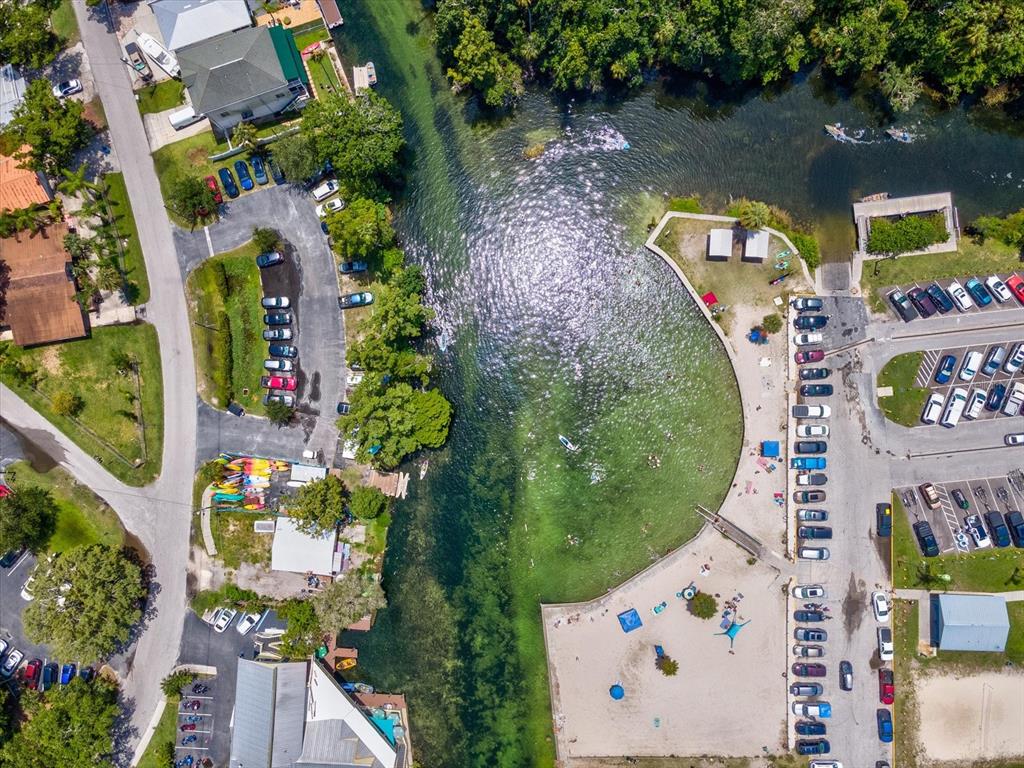 4290 Carlos Court Hernando Beach, FL 34607 - Photo 83 of 96 an aerial view of a house a yard and a pond