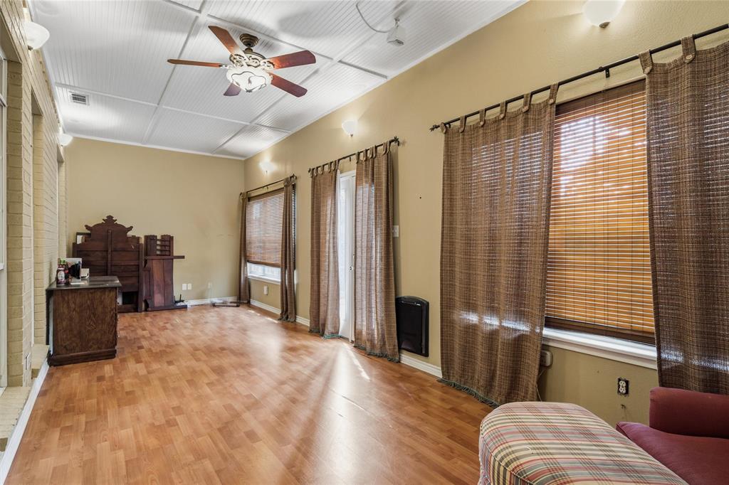 1304 Greenbriar Trail Holly Lake Ranch, TX 75765 - Photo 17 of 40 a living room with furniture and a window