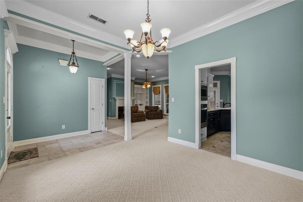 1304 Greenbriar Trail Holly Lake Ranch, TX 75765 - Photo 7 of 40 wooden floor in an empty room and a bathroom