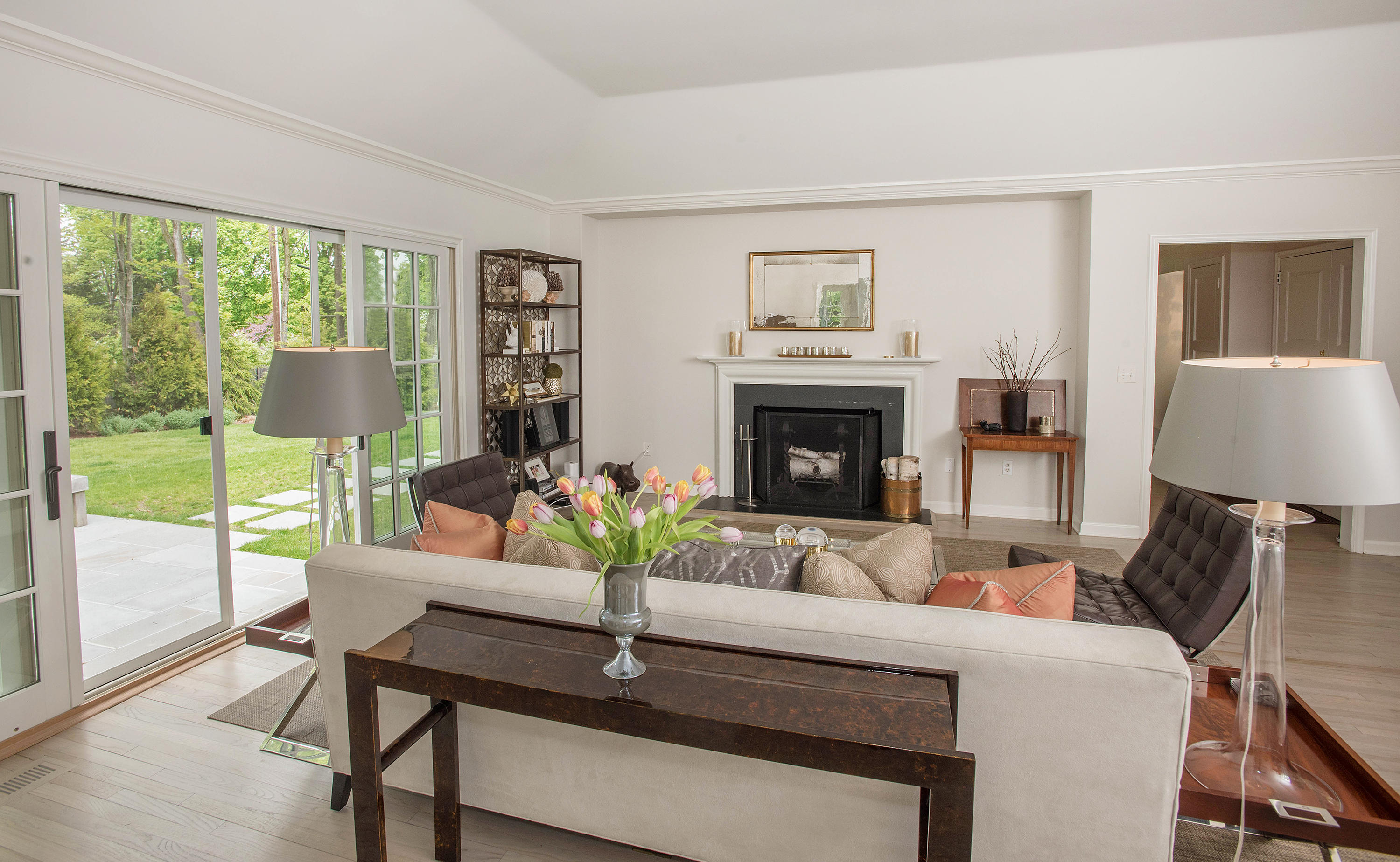 141 Oenoke Ridge New Canaan, CT 06840 - Photo 4 of 18 a living room with furniture and a fireplace