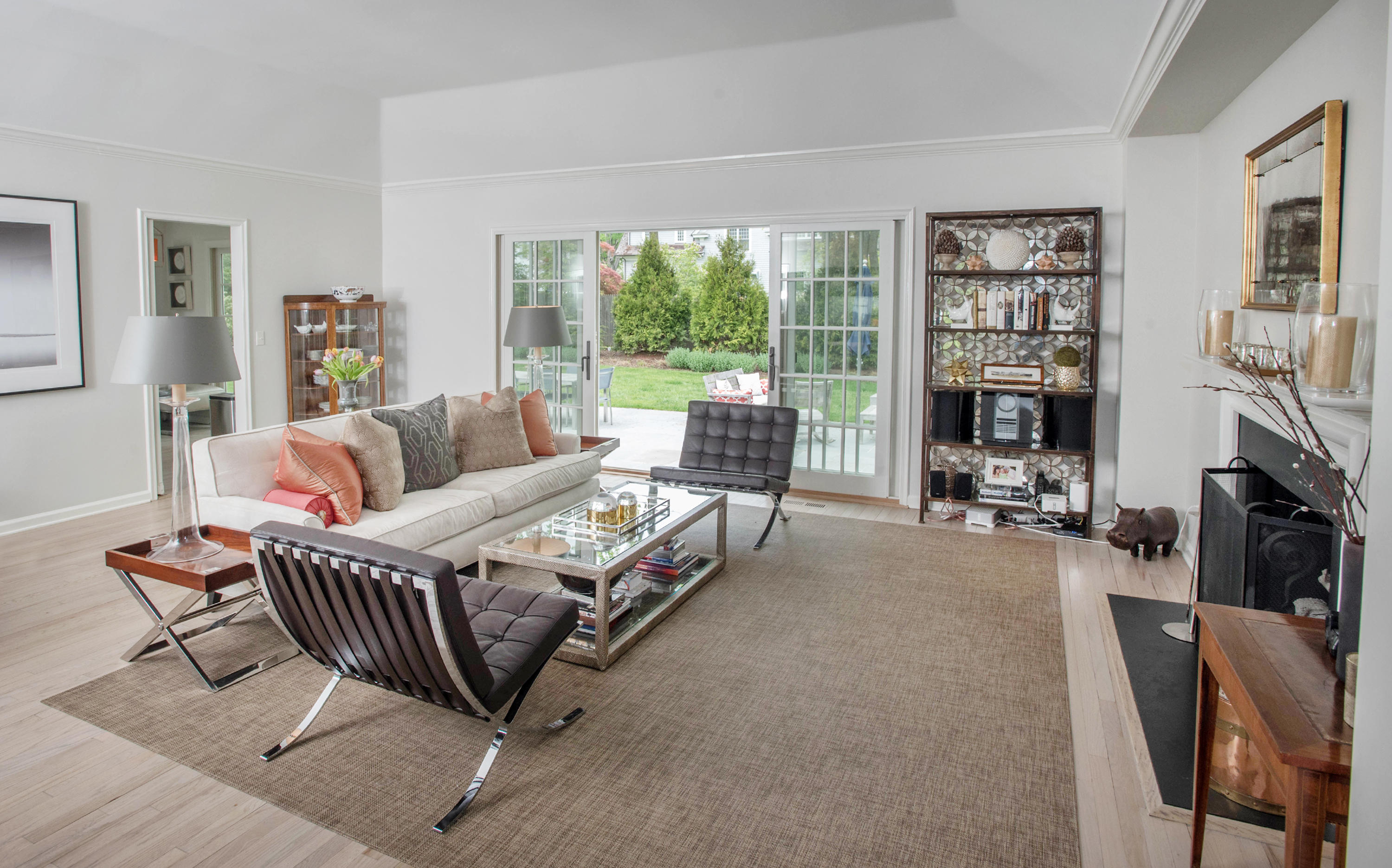 141 Oenoke Ridge New Canaan, CT 06840 - Photo 5 of 18 a living room with furniture a large window and a fireplace