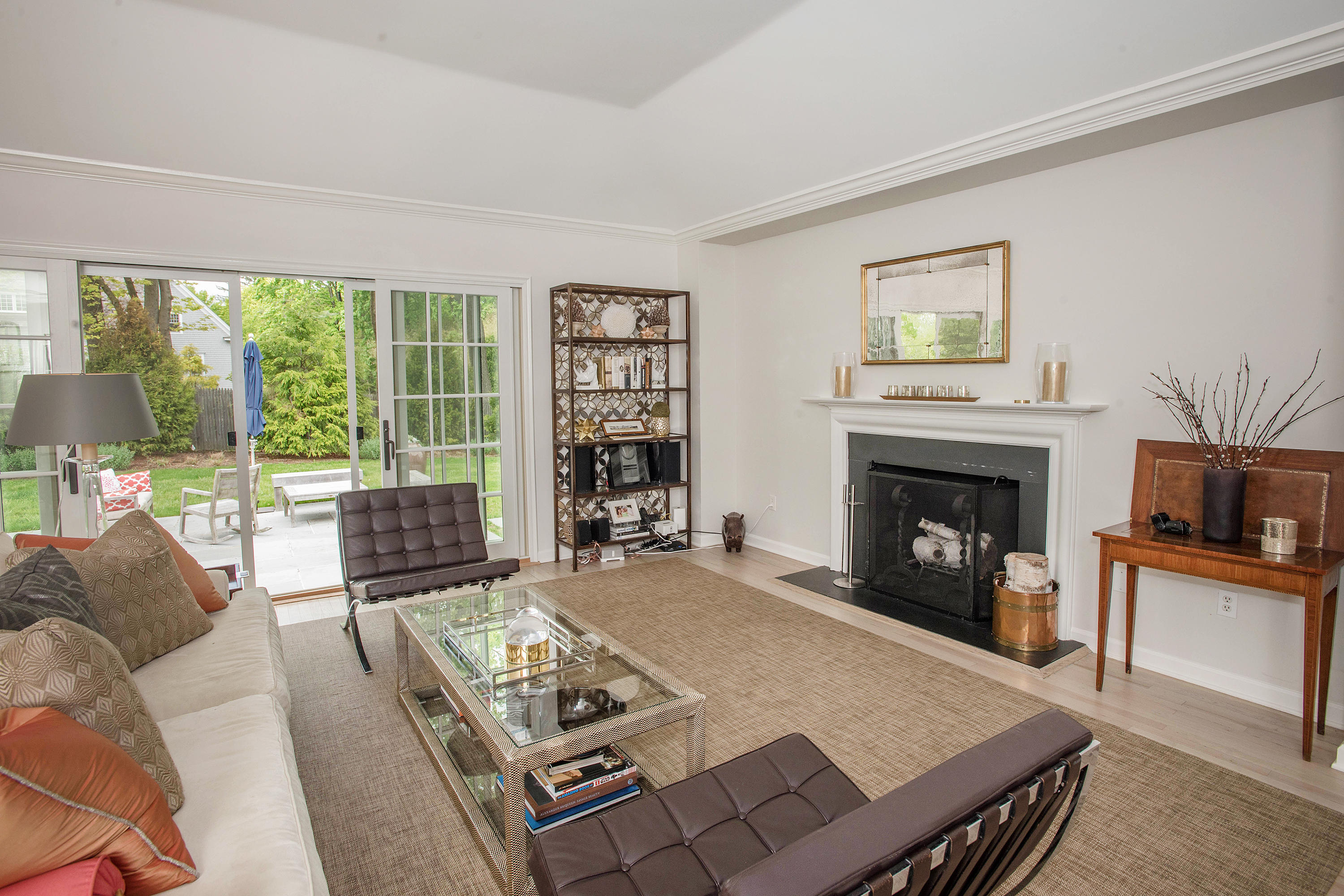 141 Oenoke Ridge New Canaan, CT 06840 - Photo 6 of 18 a living room with furniture and a fireplace