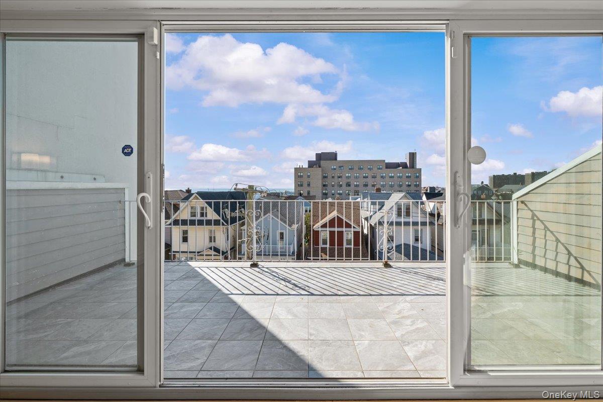 126 Beach 92nd Street, Unit 3C Queens, NY 11693 - Photo 12 of 16 a view of a balcony