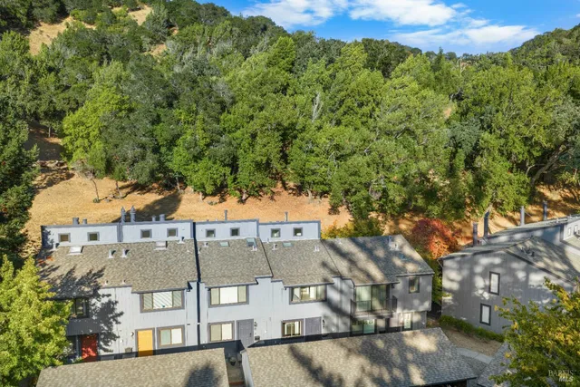 a view of a street with a building in the background