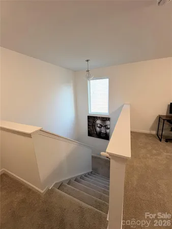 a view of a kitchen with furniture and cabinets