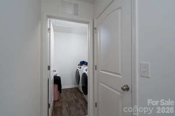 a view of hallway with closet