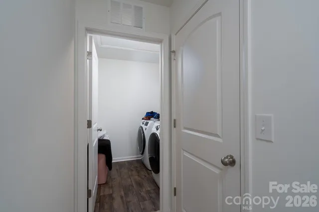 a view of hallway with closet