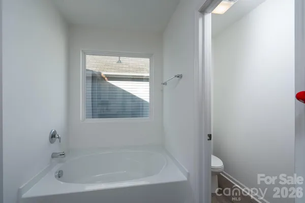 a close up of a bathtub in a bathroom