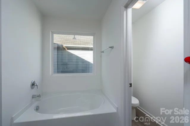 a close up of a bathtub in a bathroom