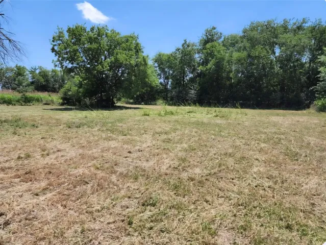 a view of backyard with outdoor space