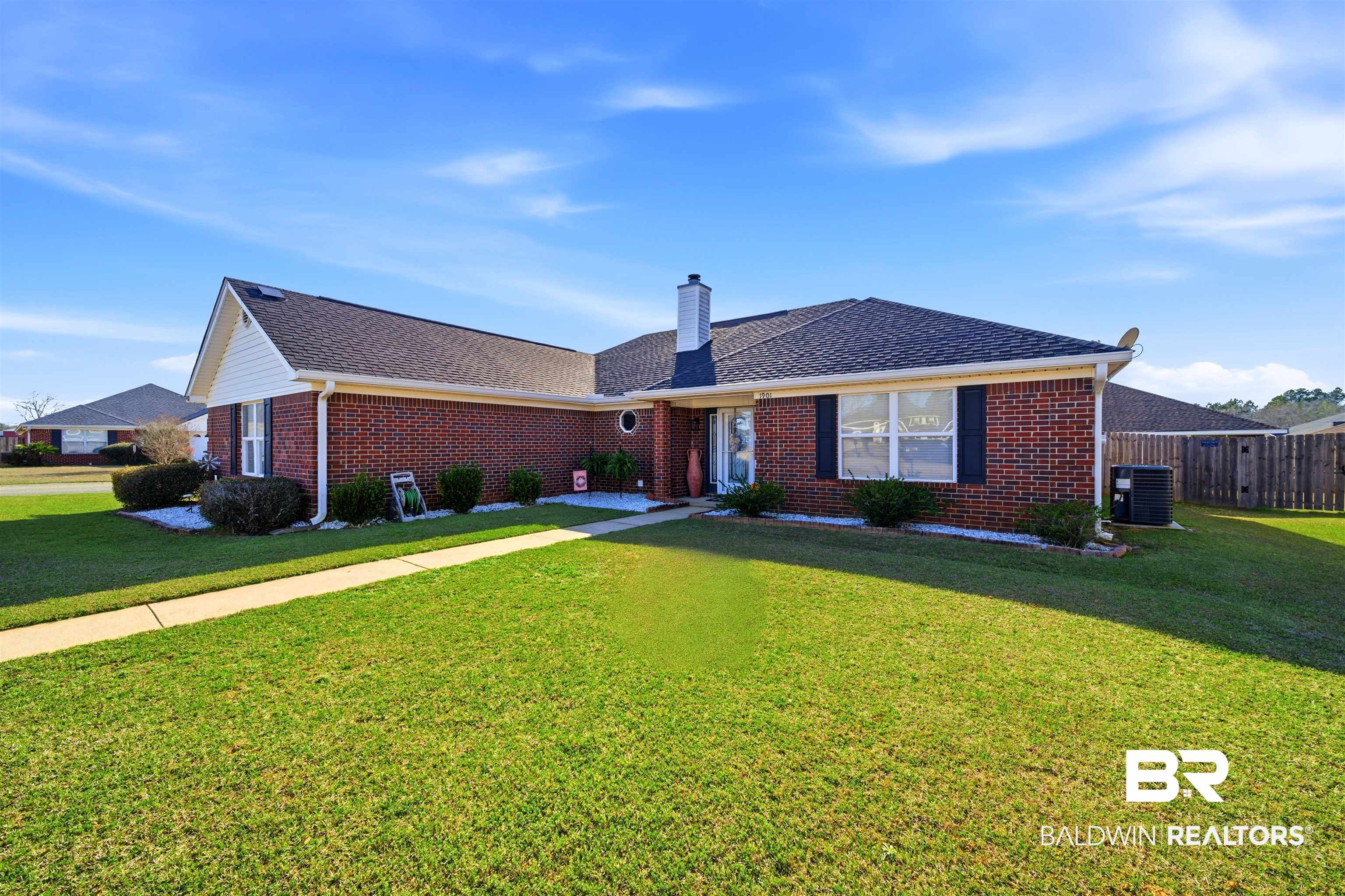 1901 Colorado Court Foley, AL 36535 - Photo 2 of 23 Ranch-style house featuring brick siding, a shingled roof, and a chimney
