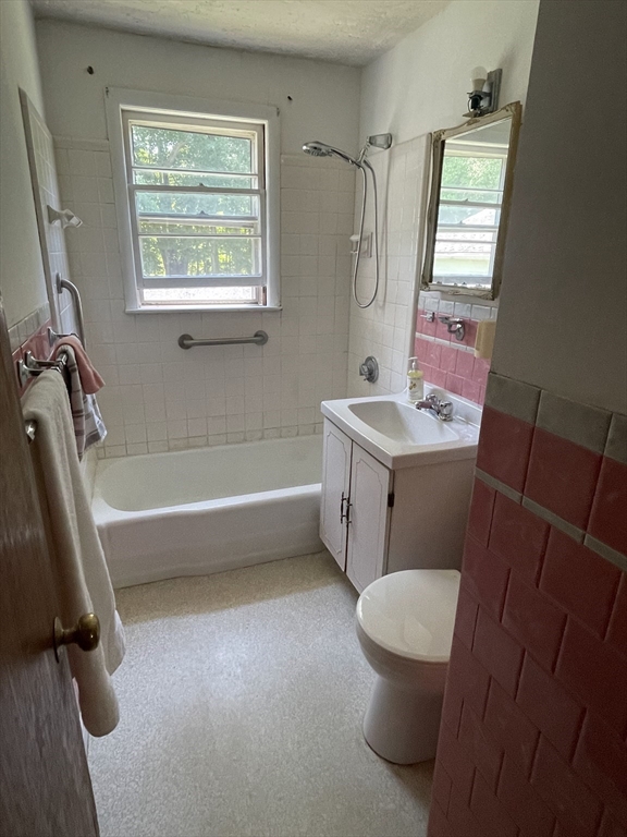 5 Brookfield Road Andover, MA 01810 - Photo 11 of 17 a bathroom with a sink toilet and shower