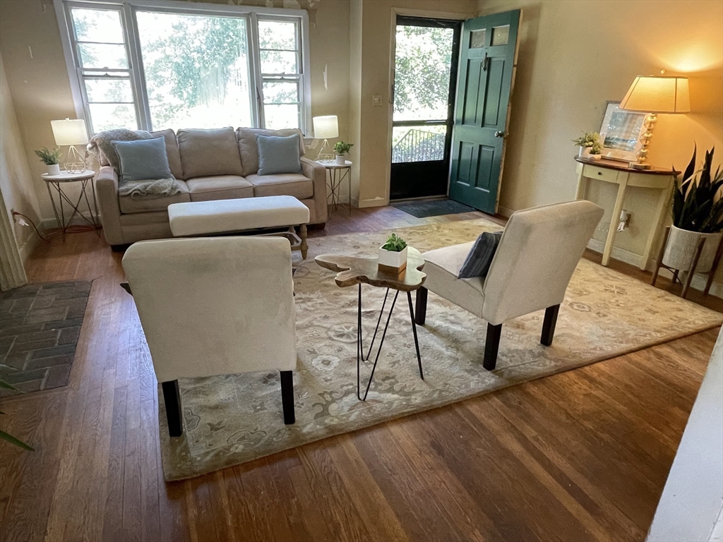 5 Brookfield Road Andover, MA 01810 - Photo 6 of 17 a living room with furniture and a window