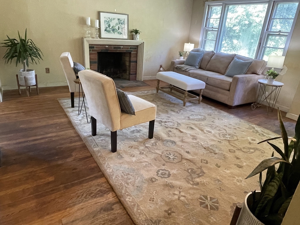 5 Brookfield Road Andover, MA 01810 - Photo 8 of 17 a living room with furniture and a fireplace