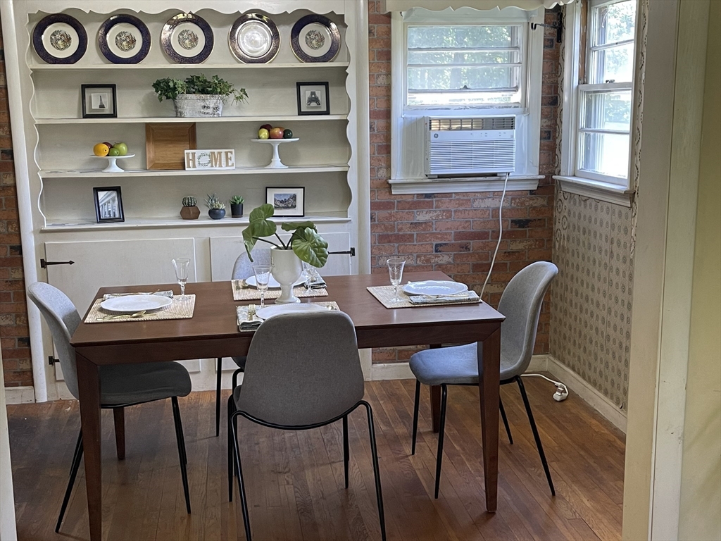 5 Brookfield Road Andover, MA 01810 - Photo 9 of 17 a view of a workspace with furniture and a window