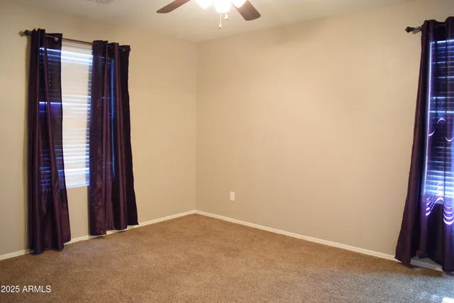 a view of a hallway with closet