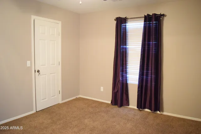 an empty room with closet