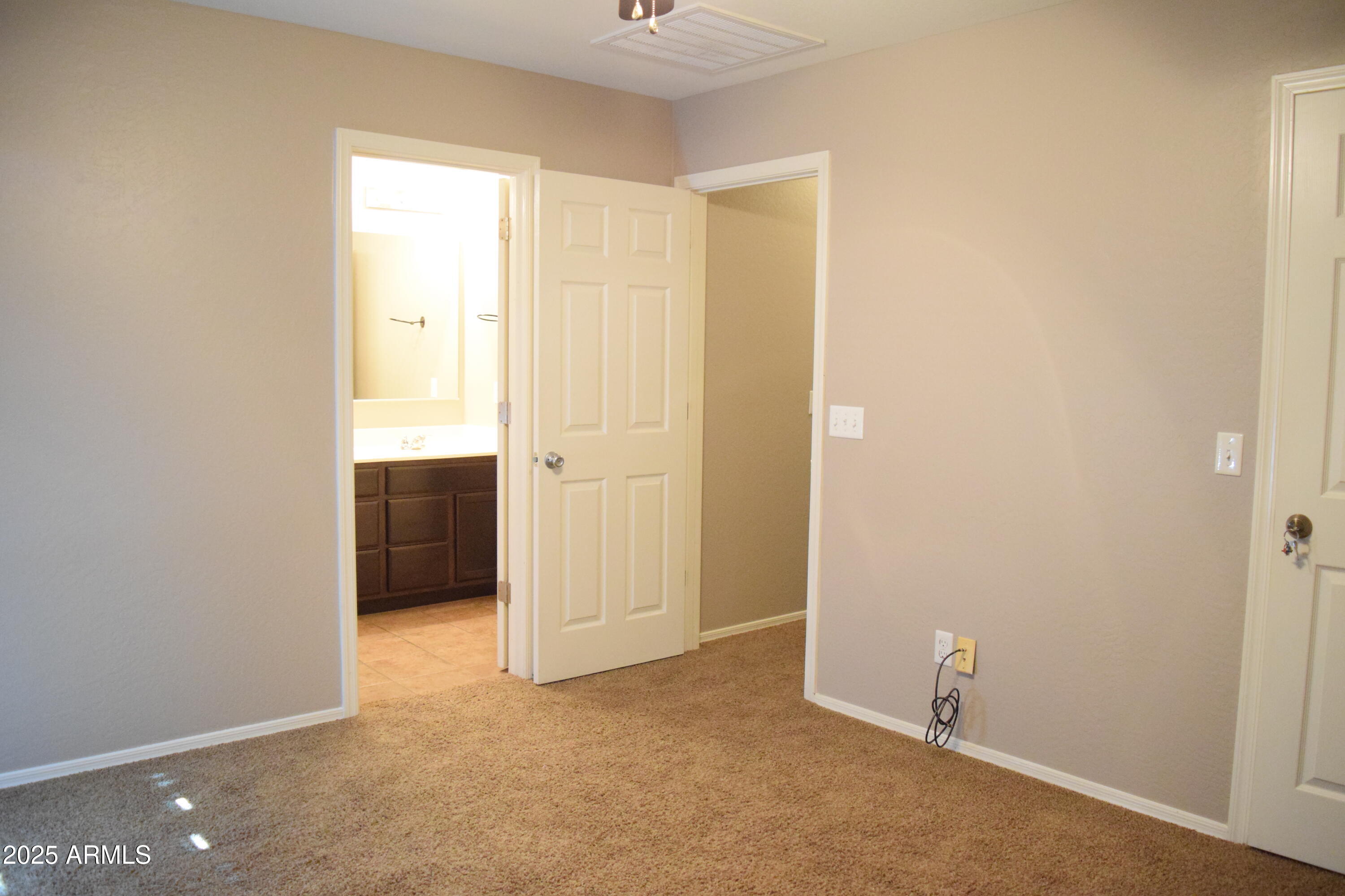 1250 South Rialto, Unit 24 Mesa, AZ 85209 - Photo 18 of 25 an empty room with closet