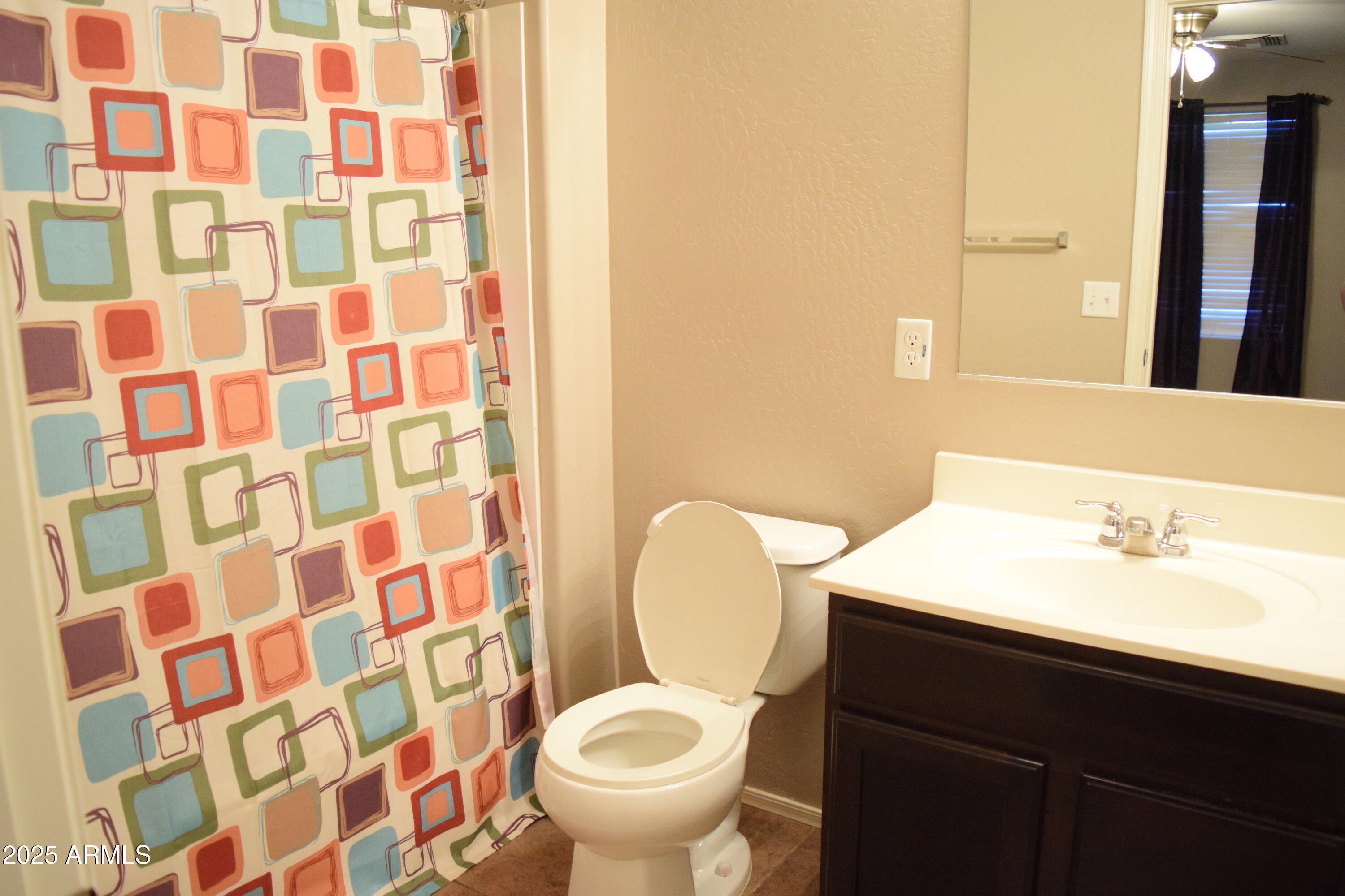 1250 South Rialto, Unit 24 Mesa, AZ 85209 - Photo 19 of 25 a bathroom with a sink and a mirror