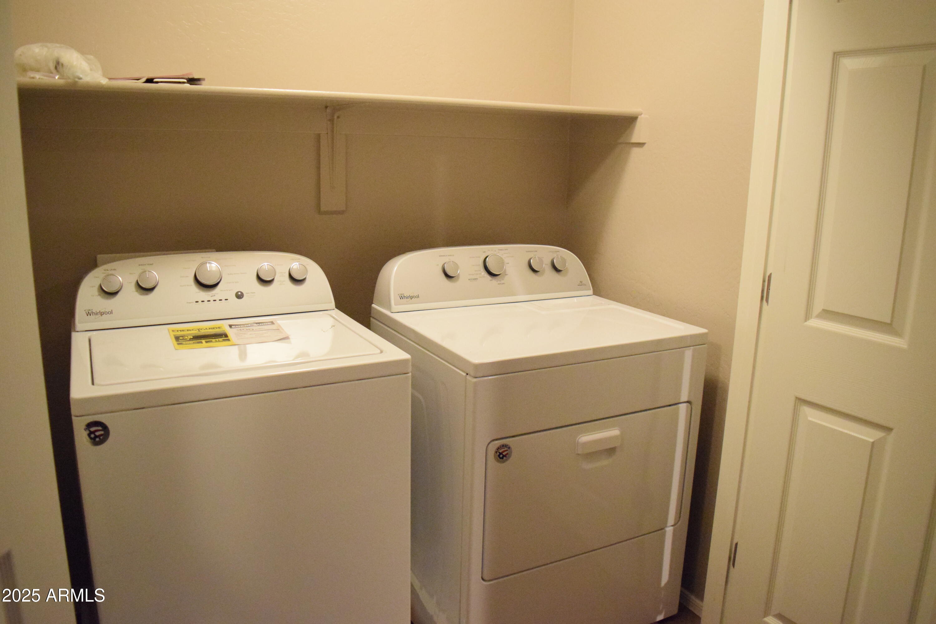 1250 South Rialto, Unit 24 Mesa, AZ 85209 - Photo 21 of 25 a utility room with dryer and washer
