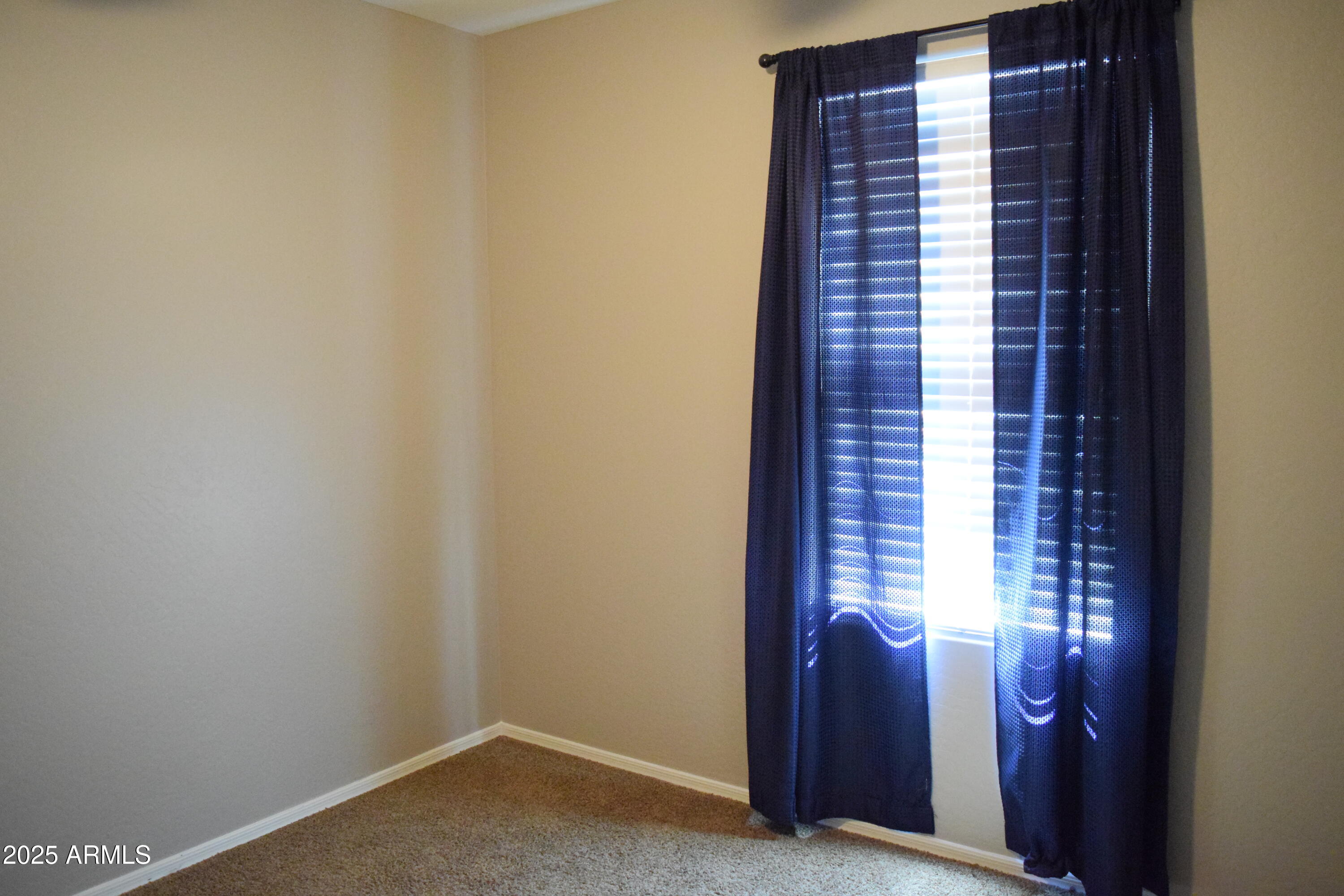 1250 South Rialto, Unit 24 Mesa, AZ 85209 - Photo 9 of 25 a view of balcony and window