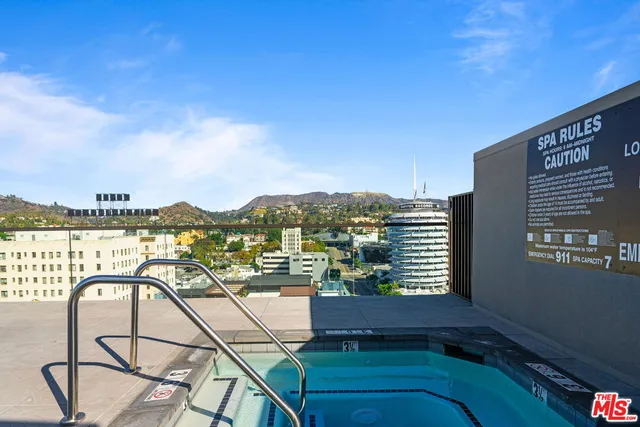 a view of a balcony with chairs