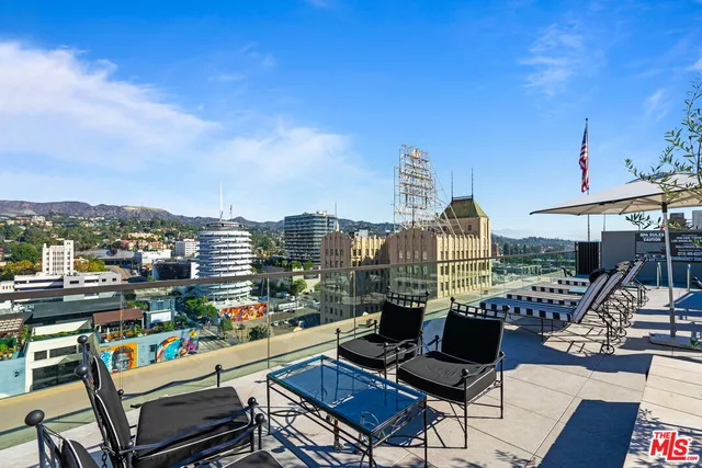 a view of a terrace with seating area