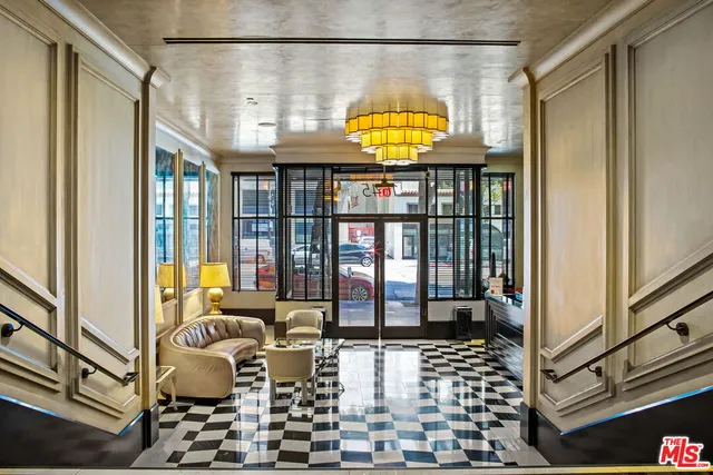 a room with furniture and a window