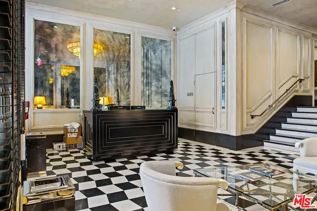 a bathroom with a toilet a sink and a shower