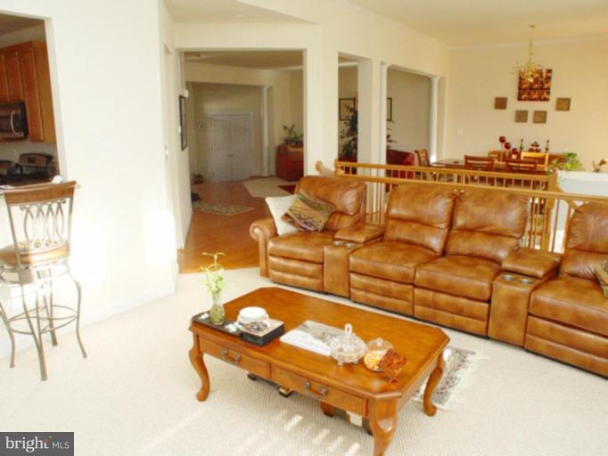 1606 Rising Ridge Road Mount Airy, MD 21771 - Photo 9 of 30 Family room is open to living and dining rooms.