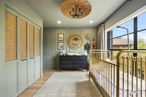 a view of entryway with a door and wooden floor