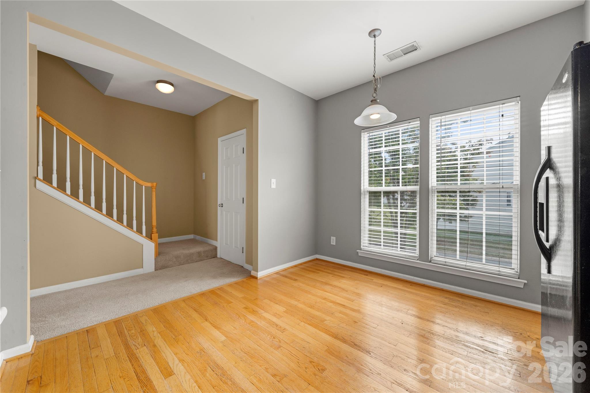 10213 Garrett Grigg Road Charlotte, NC 28262 - Photo 13 of 32 a view of empty room with windows