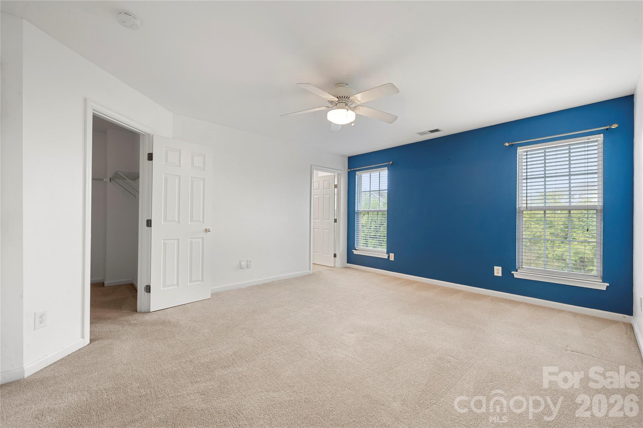 10213 Garrett Grigg Road Charlotte, NC 28262 - Photo 16 of 32 a view of an empty room with a window