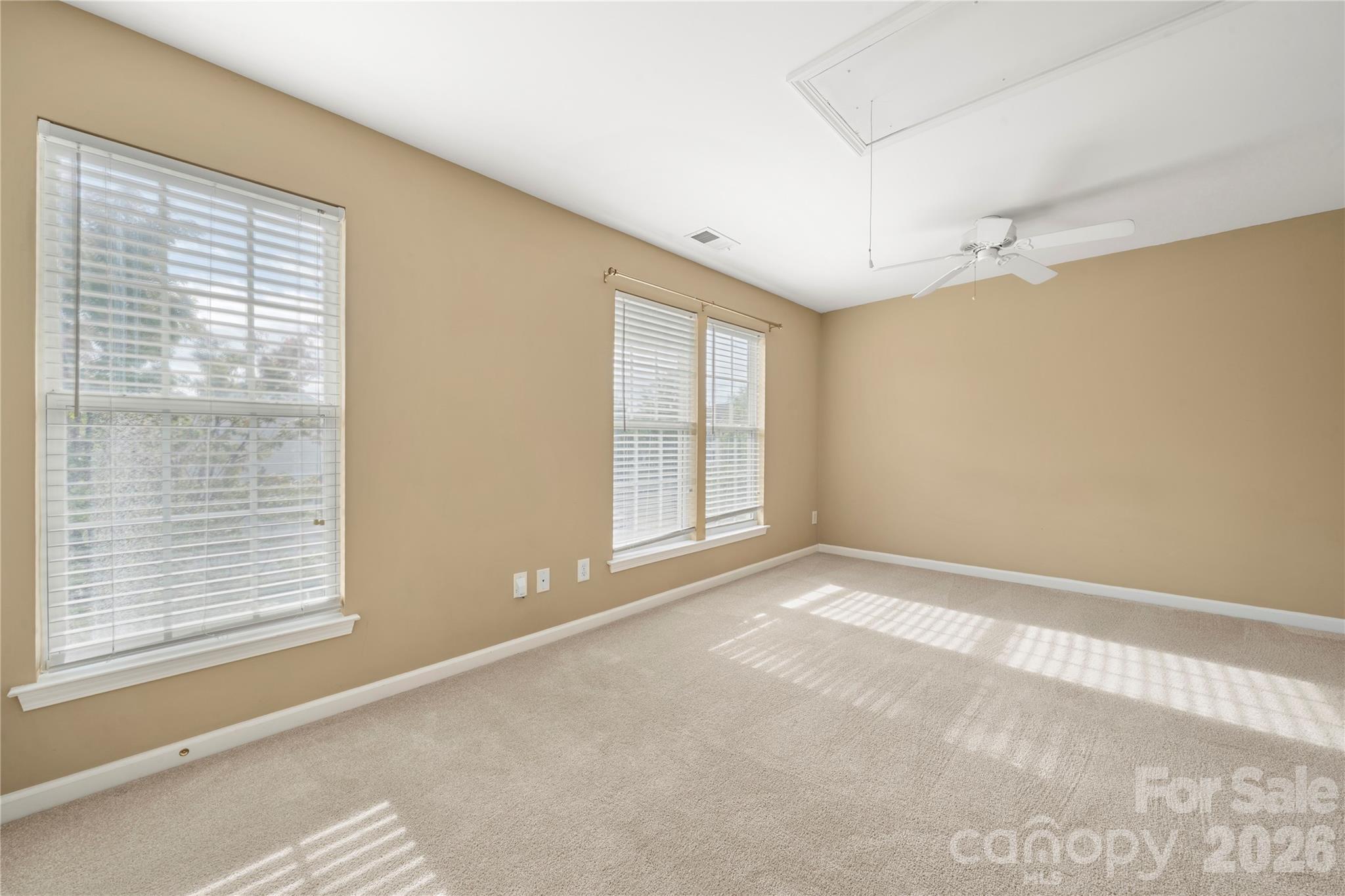 10213 Garrett Grigg Road Charlotte, NC 28262 - Photo 21 of 32 a view of an empty room with a window