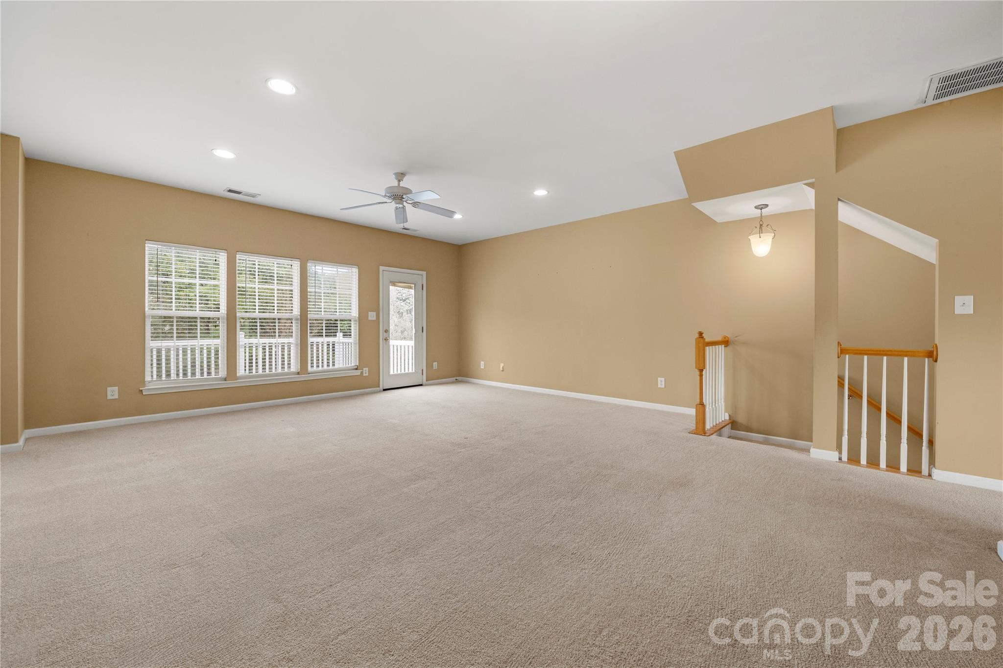 10213 Garrett Grigg Road Charlotte, NC 28262 - Photo 7 of 30 a view of an empty room with a window