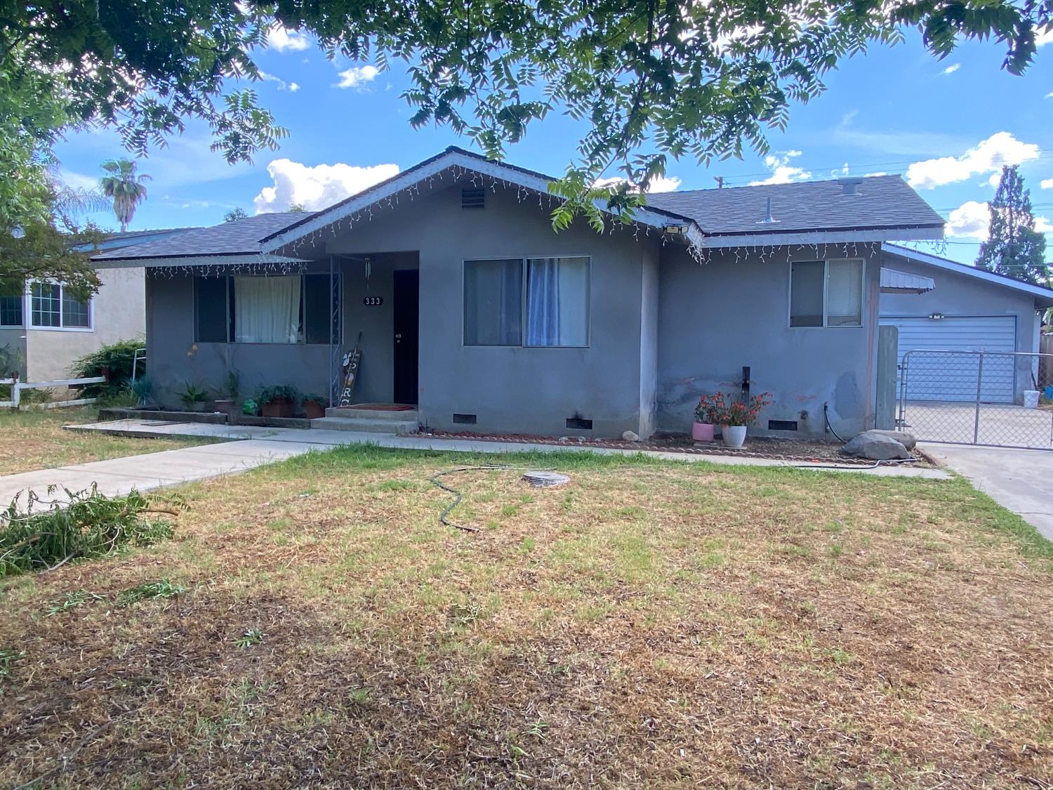 a view of a house with a yard