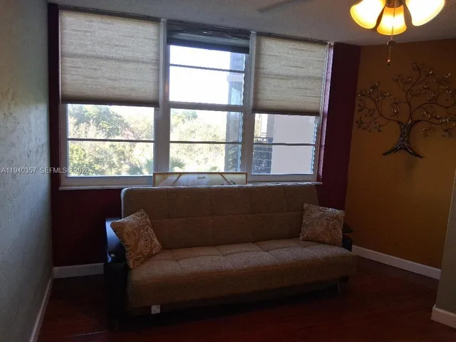a view of front door with wooden floor
