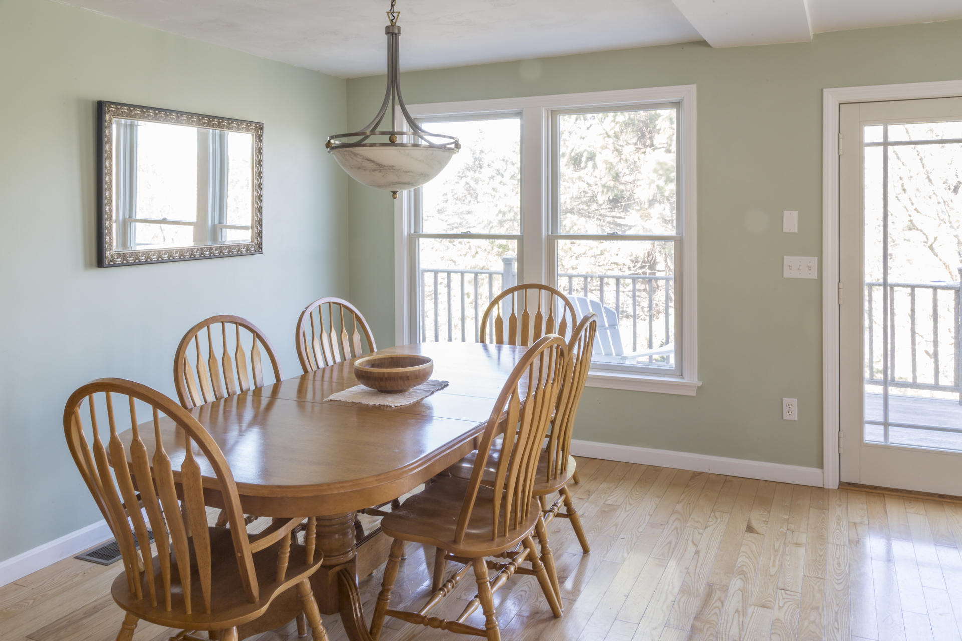 2118 Main Street Chatham, MA 02633 - Photo 11 of 33 a view of a a dining room with furniture window and wooden floor