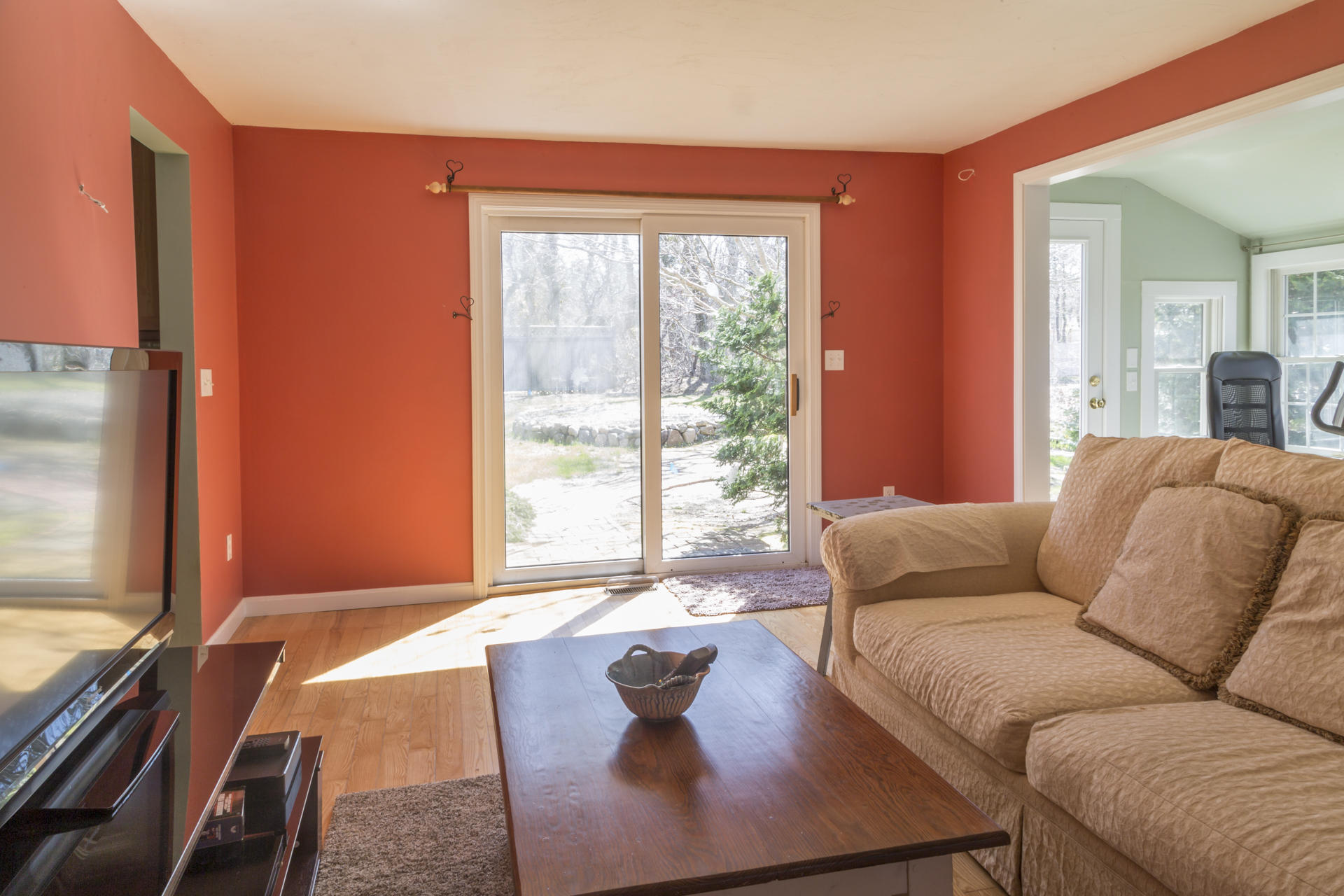 2118 Main Street Chatham, MA 02633 - Photo 16 of 33 a living room with furniture and a large window