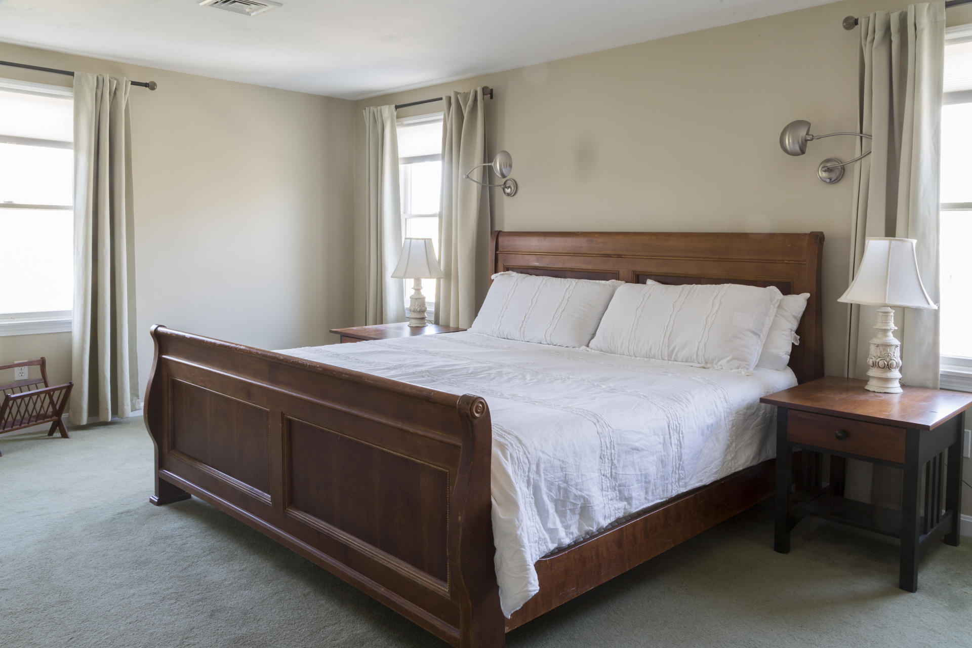 2118 Main Street Chatham, MA 02633 - Photo 20 of 33 a bedroom with a bed and a window