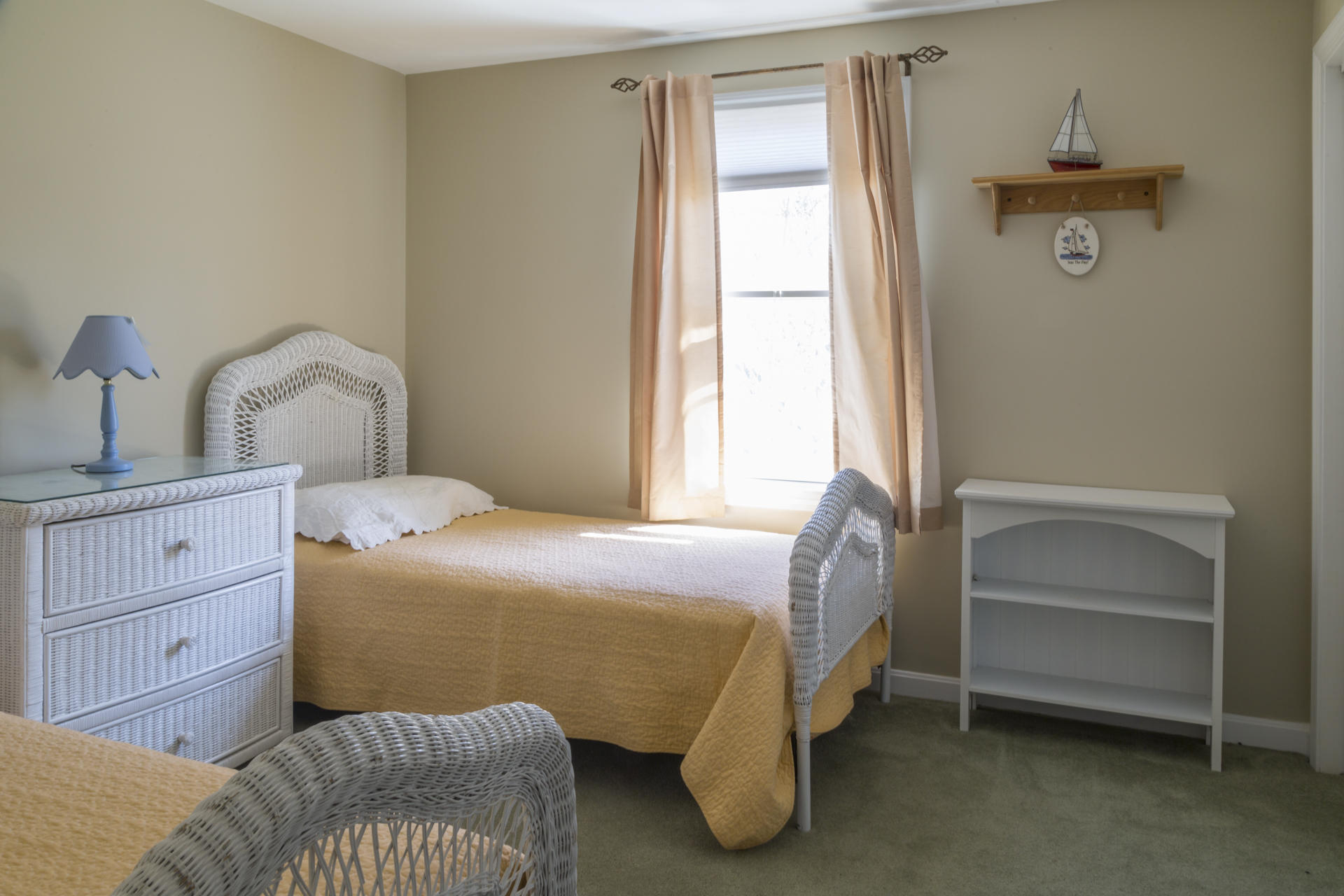 2118 Main Street Chatham, MA 02633 - Photo 24 of 33 a bedroom with a bed and a window