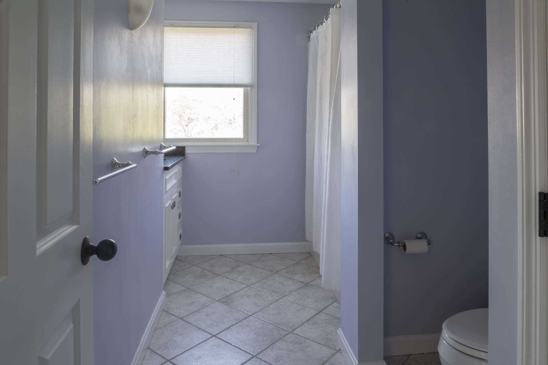 2118 Main Street Chatham, MA 02633 - Photo 27 of 33 a bathroom with a window toilet and shower