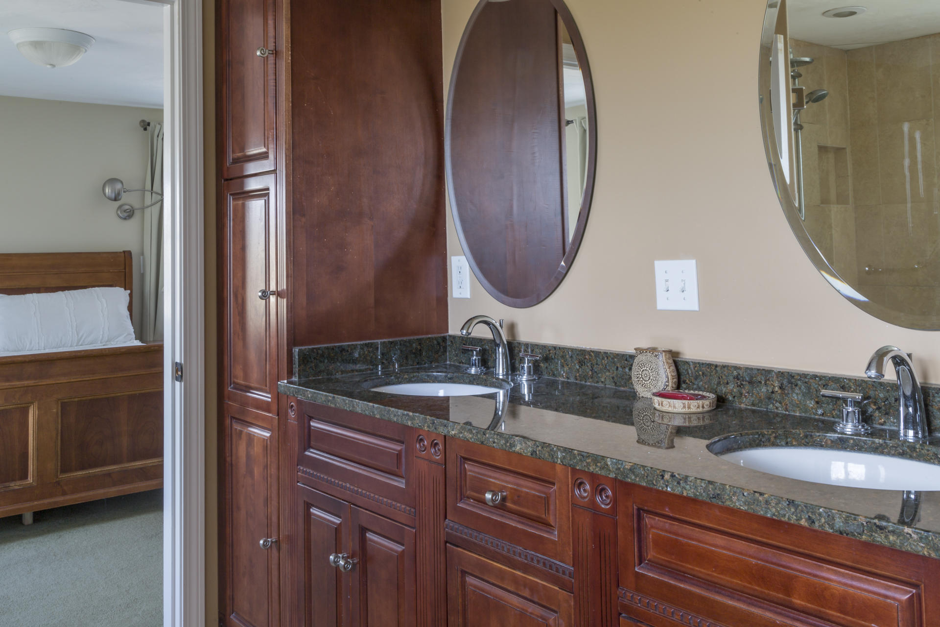2118 Main Street Chatham, MA 02633 - Photo 29 of 33 a bathroom with a granite countertop double vanity sink and a mirror
