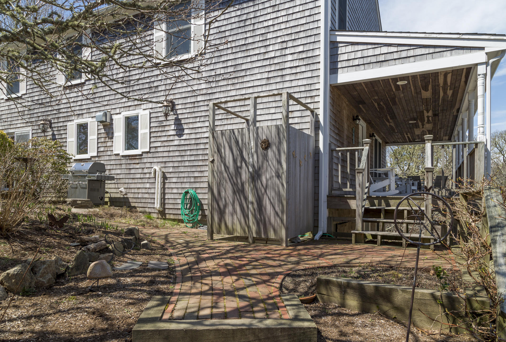 2118 Main Street Chatham, MA 02633 - Photo 3 of 33 a view of front door and small house