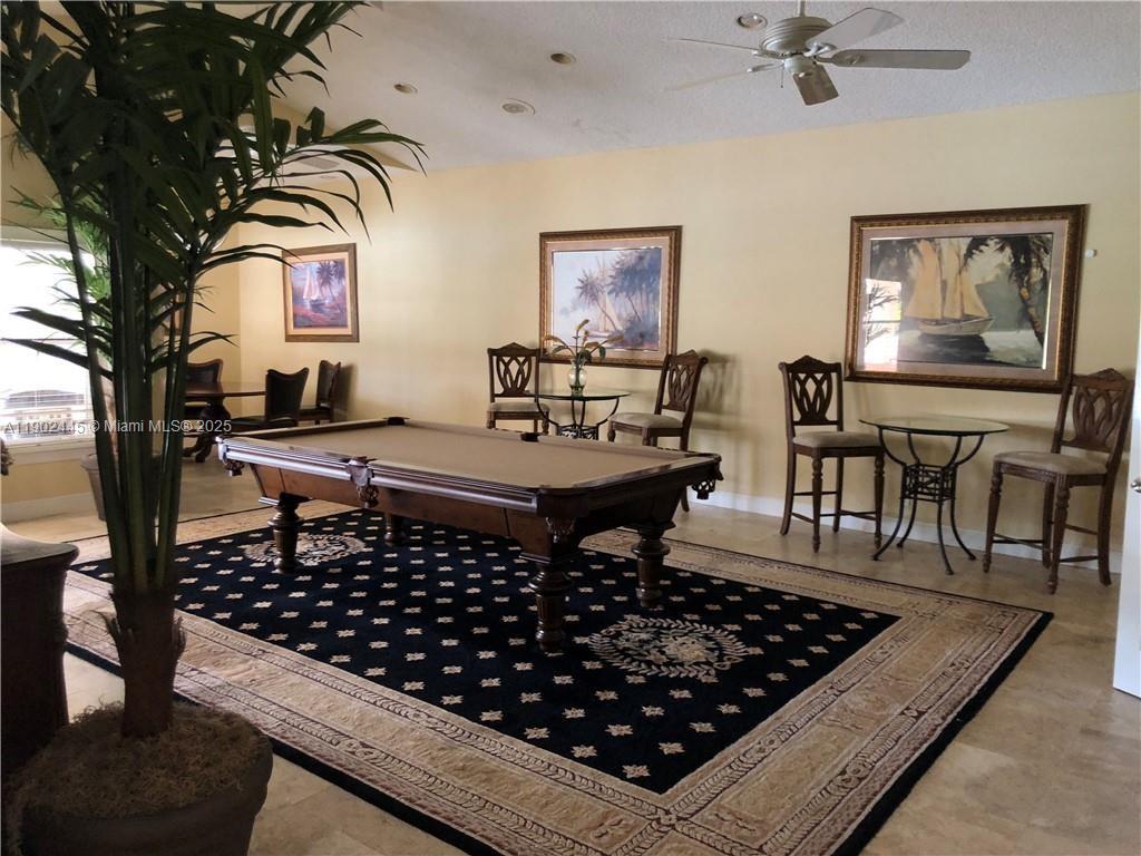 3470 Pinewalk Drive North, Unit 224 Margate, FL 33063 - Photo 17 of 24 a room with furniture pool table and window
