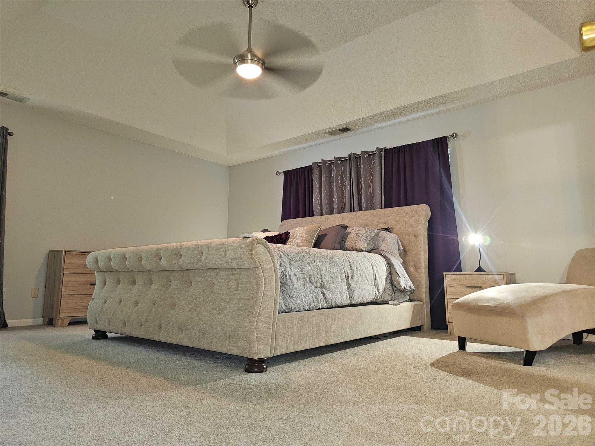 815 Knightsbridge Road Fort Mill, SC 29708 - Photo 20 of 30 a bedroom with a bed and a couch