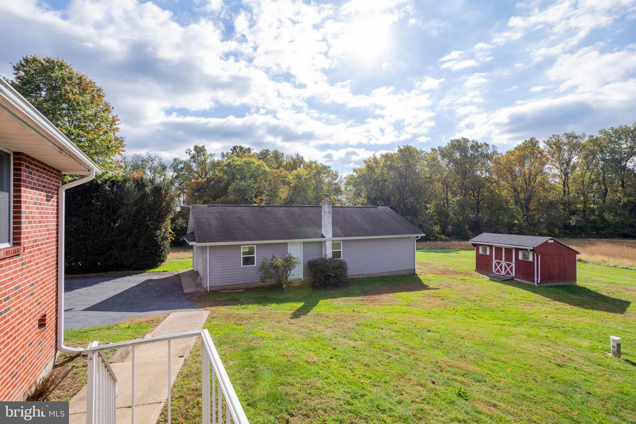 1457 Appleton Road Elkton, MD 21921 - Photo 21 of 36 Back stairwell view of detached garage & shed