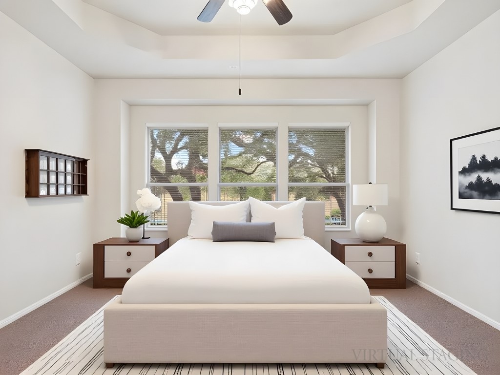 1858 Nelson Ranch Loop Cedar Park, TX 78613 - Photo 23 of 32 Bedroom featuring a raised ceiling, carpet flooring, and ceiling fan