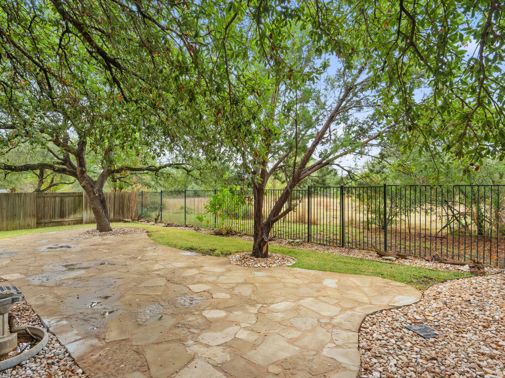 1858 Nelson Ranch Loop Cedar Park, TX 78613 - Photo 31 of 32 Fenced backyard with a patio area