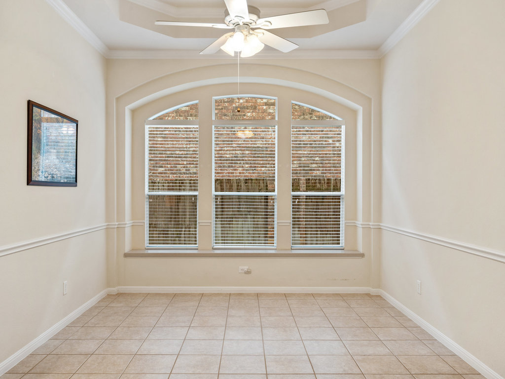 1858 Nelson Ranch Loop Cedar Park, TX 78613 - Photo 8 of 32 Dining room with ceiling fan, light tile patterned floors, ornamental molding, and healthy amount of natural light